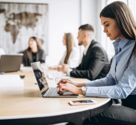 Group of people working out business plan in an office