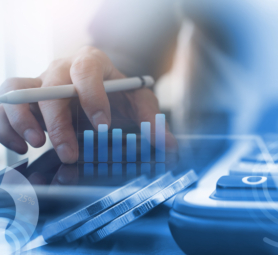 Business analysis, accounting and finance investment concept. Double exposure of business man working on digital tablet and coins with digital diagram, business data, financial graph